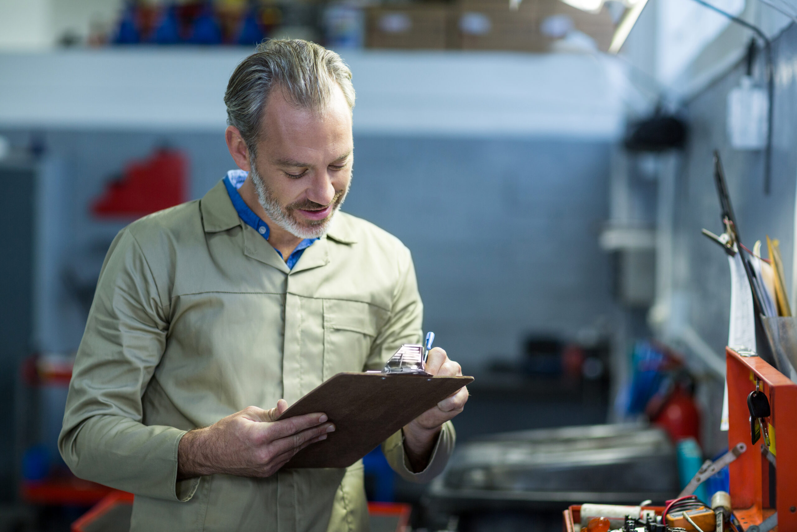 Test Engineer Writing on a Clipboard